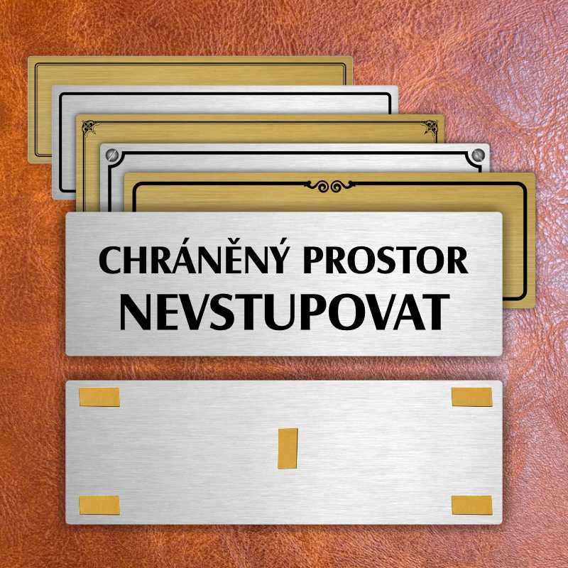 Chráněný prostor, 200x66mm, zlatá popiska s imitacemi šroubků