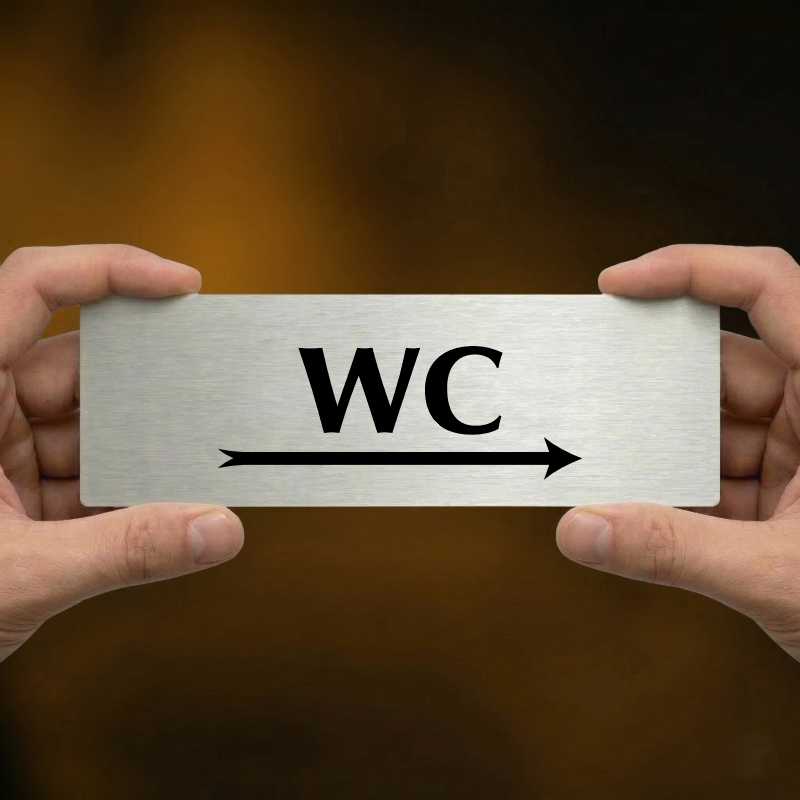 WC vpravo, 200x66mm, stříbrná popiska s dvojtým rámečkem