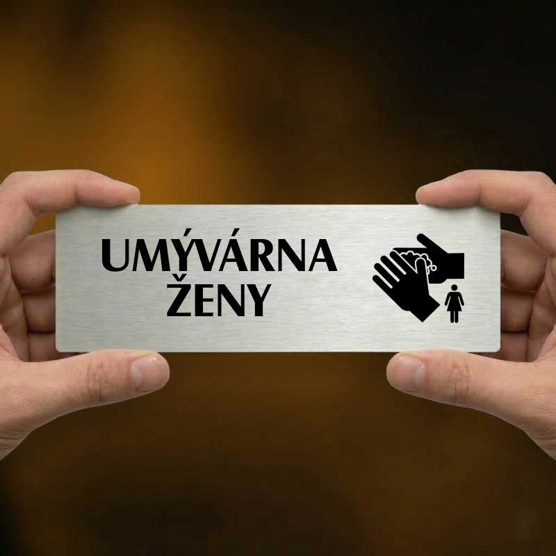 Umývárna ženy, 240x79mm, stříbrná popiska s ozdobou uprostřed