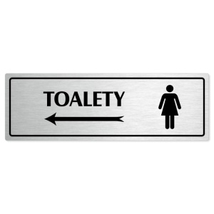 Toalety vlevo ženy, 200x66mm, stříbrná popiska s rámečkem