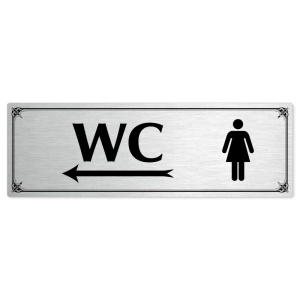 WC ženy vlevo, 200x66mm, stříbrná popiska s okrasným rámečkem  