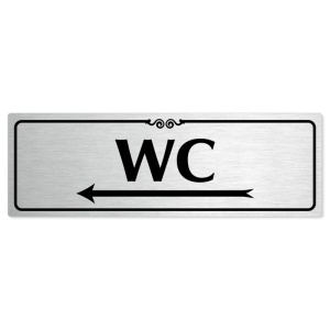 WC vlevo, 200x66mm, stříbrná popiska s ozdobou uprostřed