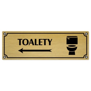 Toalety vlevo, 240x79mm, zlatá popiska s imitacemi šroubků
