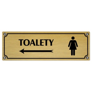 Toalety vlevo ženy, 240x79mm, zlatá popiska s imitacemi šroubků