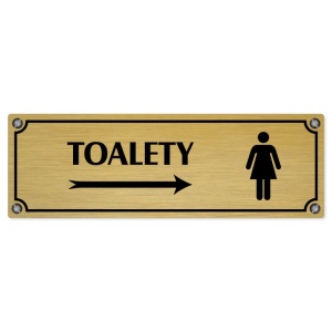 Toalety vpravo ženy, 240x79mm, zlatá popiska s imitacemi šroubků