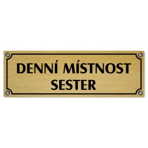 Denní místnost sester, 240x79mm, zlatá popiska s imitacemi šroubků